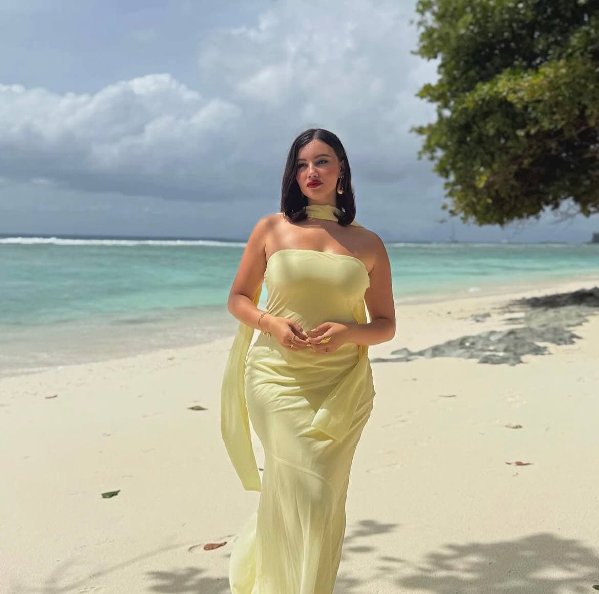 Yellow chiffon gown on the beach